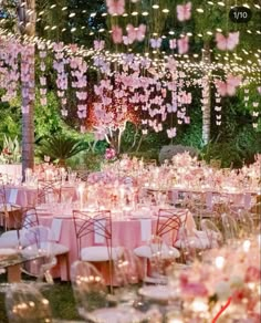 the tables are set with pink and white linens