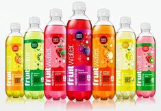 six bottles of fruit flavored water are lined up