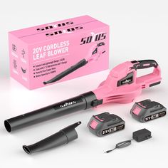 the pink cordless leaf blower is next to its box and accessories for it