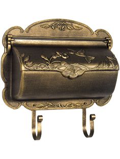 an old fashioned mailbox is shown on a white background and it's painted gold