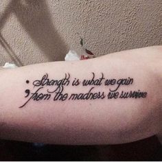 a tattoo saying strength is what we gain from the machines we winne