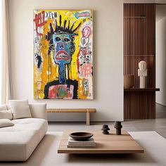 a living room filled with furniture and a painting on the wall