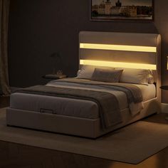 a bedroom with a bed, night stand and lamps on the side tables in front of it