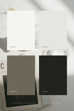 three different shades of gray and white