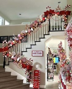 a staircase decorated with candy canes and candies