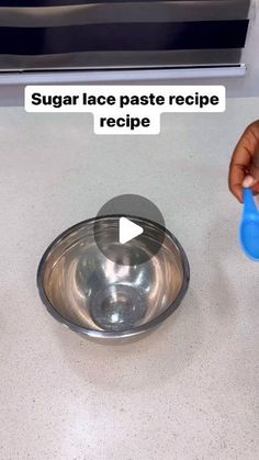 someone is pouring sugar into a bowl on top of a counter with the words sugar face paste recipe