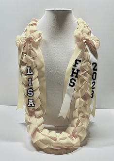 a white mannequin with ribbon around it and the words florida on its side