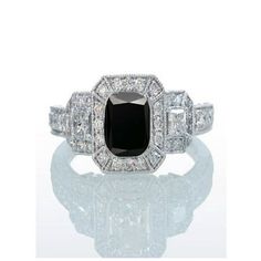 a black and white diamond ring