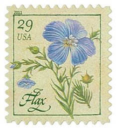 a postage stamp with blue flowers and the word flax written in green on it