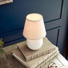 Our versatile Landry Mini Lamp features a timeless globe shape and textural off white finish for a classic look. Topped with a European fitted shade, this tiny table lamp will complement any decor. A charming accent lamp for the kitchen counter, bathroom vanity or open shelving vignette. Mini Lamp measures: 5.25 x 5.25 x 8.5 tallMax wattage: 25WSocket: E12Comes with European fitted shade. Small Kitchen Counter Lamps, Mini Lamp Decor, Mini Lamp For Kitchen Counter, Kitchen Counter Lamps, Lamp For Kitchen Counter, Small Kitchen Counter, Tiny Table, Counter Bathroom, Lamps For Kitchen