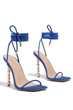 SIZE & FIT HEEL HEIGHT APPROX: 4.5" TRUE TO SIZE ALL MEASUREMENTS ARE MADE ON A SIZE 6.5 SHOE. THERE MAY BE SLIGHT MEASUREMENT VARIATIONS BASED ON SIZE. PRODUCT DETAILS AROUND-THE-ANKLE LACE-UP CLOSURE GOLD-TONE HEEL OPEN SQUARED TOE LIGHTLY PADDED INSOLE Royal Blue Heels, Fancy Heels, Denim Heels, Fashion Shoes Heels, Cute Shoes Heels, Shoes Heels Classy, Shoes Hack, Heels Classy, Fancy Shoes