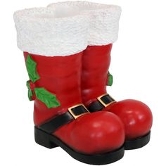 a pair of red boots with christmas decorations on them