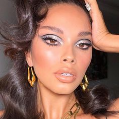 The 2024 Makeup Trends To Watch Out For, According To Top MUAs | Glamour UK Maquillage Goth, Disco Makeup, Instagram Makeup Artist, Peachy Blush, Silver Eye Makeup, Nye Makeup, Shimmer Eye Makeup, 70s Makeup