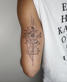 a man's arm with a tattoo on it that has lines and dots in the middle