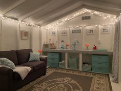 a living room filled with furniture and lights