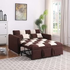 a living room with a brown and white checkered couch