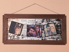 a wooden frame with four pictures hanging from it