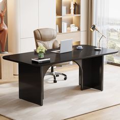 an office desk with a laptop on it in front of a bookcase and window