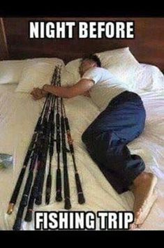 a man laying on top of a bed with lots of fishing rods attached to it