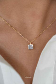 This elegant Princess Cut Solitaire Diamond Necklace is crafted with a high-grade simulated diamond and is plated with 14k gold on sterling silver. It is finished with an anti-tarnish coat and an e-coat for long-lasting preservation of the plating. It's a perfect addition to your jewelry collection and makes a great gift for birthdays, graduations, or for your best friend. PRODUCT DETAILS: * Necklace Length is Adjustable from  15. 5 inches to 17.5 inches with 2 inch of extenders * Comes with 2 i Princess Cut Solitaire Necklace Fine Jewelry Gift, Princess Cut Solitaire Necklace For Gift, Princess Cut Solitaire Necklace As Gift, Princess Cut Solitaire Necklace Fine Jewelry, Princess Cut Diamond Solitaire Necklace Gift, Fine Jewelry Princess Cut Cubic Zirconia Necklace, Princess Cut Solitaire Diamond Necklace As A Gift, Classic Cubic Zirconia Princess Cut Necklace, Fine Jewelry Cubic Zirconia Princess Cut Necklace