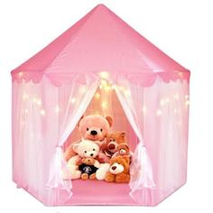 a pink play tent with teddy bears in it