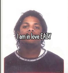 a man with the words i am in love eazy on his face and an image of