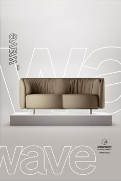 an image of a couch on display with the words wave in white and black letters