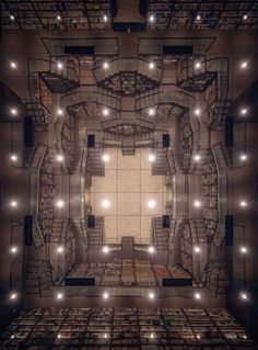 an overhead view of a room with bookshelves and lights on the ceiling, as seen from above