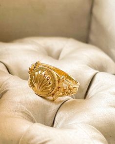 The Venus RIng is a beautiful ornate gold scallop ring. We celebrate the Goddess of Love with this ring. !8K Gold plated silver All items come in a gift box ready to gift. To see more please visit  https://www.etsy.com/shop/BijouLimon Bijou Limon jewelry collections present a romantic French spin on the latest jewelry trends. Based on the US West Coast but French at heart, Bijou Limon interprets the current jewelry trends and delivers timeless pieces that make you swoon. From Necklaces, Earrings Heirloom Gold Flower Ring, Vintage Open Dome Ring For Wedding, Beach Wedding Jewelry, Fantasy Earrings, Latest Jewellery Trends, Style Cottage, Vintage Jewelry Necklace, Snake Jewelry, Shell Ring