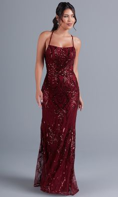 Simply gorgeous, this exciting long sequin prom dress is an exclusive style sold only at PromGirl. The fully-lined long formal dress has a sheer overlay that boasts a shimmering sequin pattern from the neckline to the hem of the curve-hugging long skirt. Supportive spaghetti straps round the shoulders before creating a statement by crossing the open back and tying into a bow. For a sparkly look at prom, fancy galas, and other black-tie formal events, slip into this luxurious statement-back long Burgundy Sparkly Prom Dress, Cabernet Prom Dress, Dark Colored Prom Dresses Long, Cranberry Prom Dress, Burgundy Prom Dress Long Fitted, Deep Red Prom Dress Burgundy, Appropriate Prom Dresses, Orom Dresses, Casino Theme Prom Dress