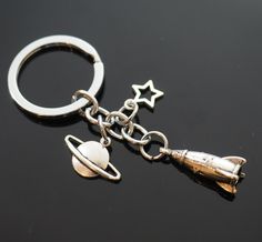 Rocket Spaceship Star Planet Saturn Pendant  Charms Steel Silver Color Keychain One Key chain with 3 charms Great gift for: Space / Astronomy Lovers Backpack Chains Key Rings, Cute Bag Keychains, Gifts For Astronomy Lovers, Gifts For Space Lovers, Cool Key Chains, Cool Charms, Backpack Accessories Keychain, Backpack Keychains Aesthetic, Space Keychains