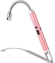 a pink electric toothbrush is attached to a metal faucet with a hose