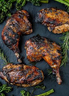 grilled chicken and broccoli on a slate platter