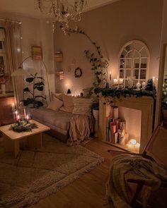 a living room filled with furniture and candles