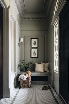 the inside of a house is shown with pictures on it and in front of an open door