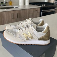 Jcrew Gold And Ivory New Balance. Nib. Limited Edition. Brand New. Size 7.5. J Crew New Balance, J Crew Teddie Sweater, J Crew Animal Print Sweater, American Flag Sweater, Leopard Sneakers, Swim Shoes, Suede Lace, 70s Retro, Retro Sneakers