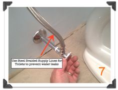 a hand holding a water hose in front of a toilet with the text, use sealed supply lines for toilets to prevent water leaks