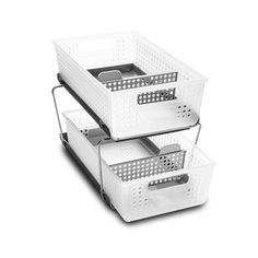 two white storage baskets stacked on top of each other with handles and dividers in them