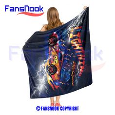 the back of a woman's hooded towel with an image of a lightning car on it