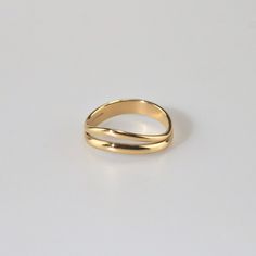 Modern yet timeless, the gold wave ring features a split shank. It is the stylish but simple piece you've been looking for. Wear it alone or stack with other rings to make a statement look. 18k gold plated Stainless steel based Waterproof and tarnish free Available in US size 6-8 Ring sizing chart Rings To Make, Gold Wave Ring, Gold Rings Simple, Gold Waves, Gold Ring Designs, Wave Ring, Everyday Rings, Split Shank, Timeless Jewelry