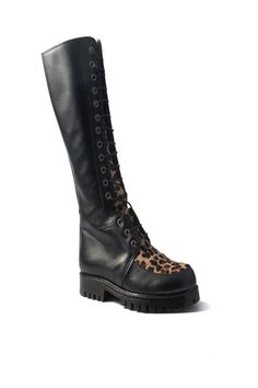 This statement combat boot with leopard print detailing, is the perfect luxury piece to add a rockstar edge to your fall and winter wardrobe. Cowhide hair Leather sole Fits true to size Heel Height: 1" (25mm) Terry De Havilland, Festival Boots, Leopard Black, Leopard Heels, Cold Weather Fashion, Combat Boot, Black Leopard, Fall And Winter, Leather Ankle Boots