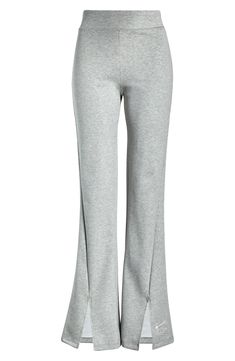 Nike Stretch Athleisure Sweatpants, Nike Stretch Cotton Pants, Nike Elastane Yoga Bottoms, Stretch Athleisure Wide Leg Pants, Stretch Wide Leg Full Length Pants In Athleisure Style, Wide Leg Athleisure Leggings For Loungewear, Nike Stretch Bottoms For Loungewear, Nike Full Length Athleisure Sweatpants, Nike Fitted Bottoms For Loungewear