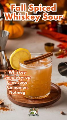 the fall spiced whiskey sourr recipe is ready to be served on the table