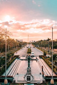 an aerial view of the eiffel tower and fountain in paris, france at sunset