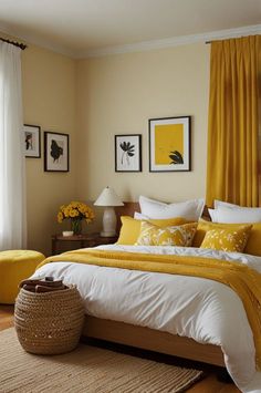 a bedroom with yellow and white bedding, pictures on the wall and rugs