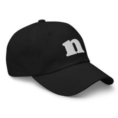 Message direct for customization. Check out our Alphabet Hat Collection here: https://www.etsy.com/shop/GDSLabel?ref=seller-platform-mcnav&search_query=alphabet+hat Highlight your unique identity with the "Lowercase Letter N Embroidered Dad Hat." This cap offers a minimalist yet stylish design, perfect for anyone seeking to subtly showcase their personal touch through fashion. * 100% chino cotton twill * Green Camo color is 35% chino cotton twill, 65% polyester * Unstructured, 6-panel, low-profi Name Typography, Lowercase Letter, Abc Alphabet, Single Letter, Hat Collection, Letter N, Camo Colors, Green Camo, Dad Hat