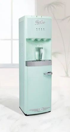 a water dispenser sitting on top of a counter