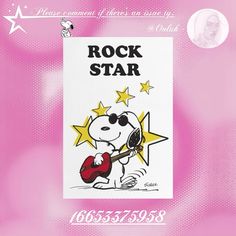 a sticker with a cartoon character holding a guitar and stars on it's back