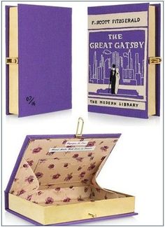 the great gatsby by f scott fitzgerald book opened in purple and gold leather