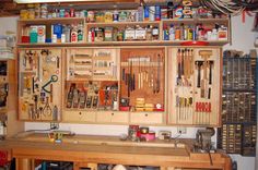 a workbench with lots of tools on it